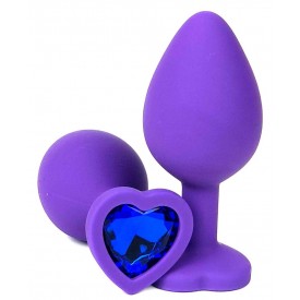 Фиолетовая силиконовая анальная пробка с синим стразом-сердцем - 10,5 см.